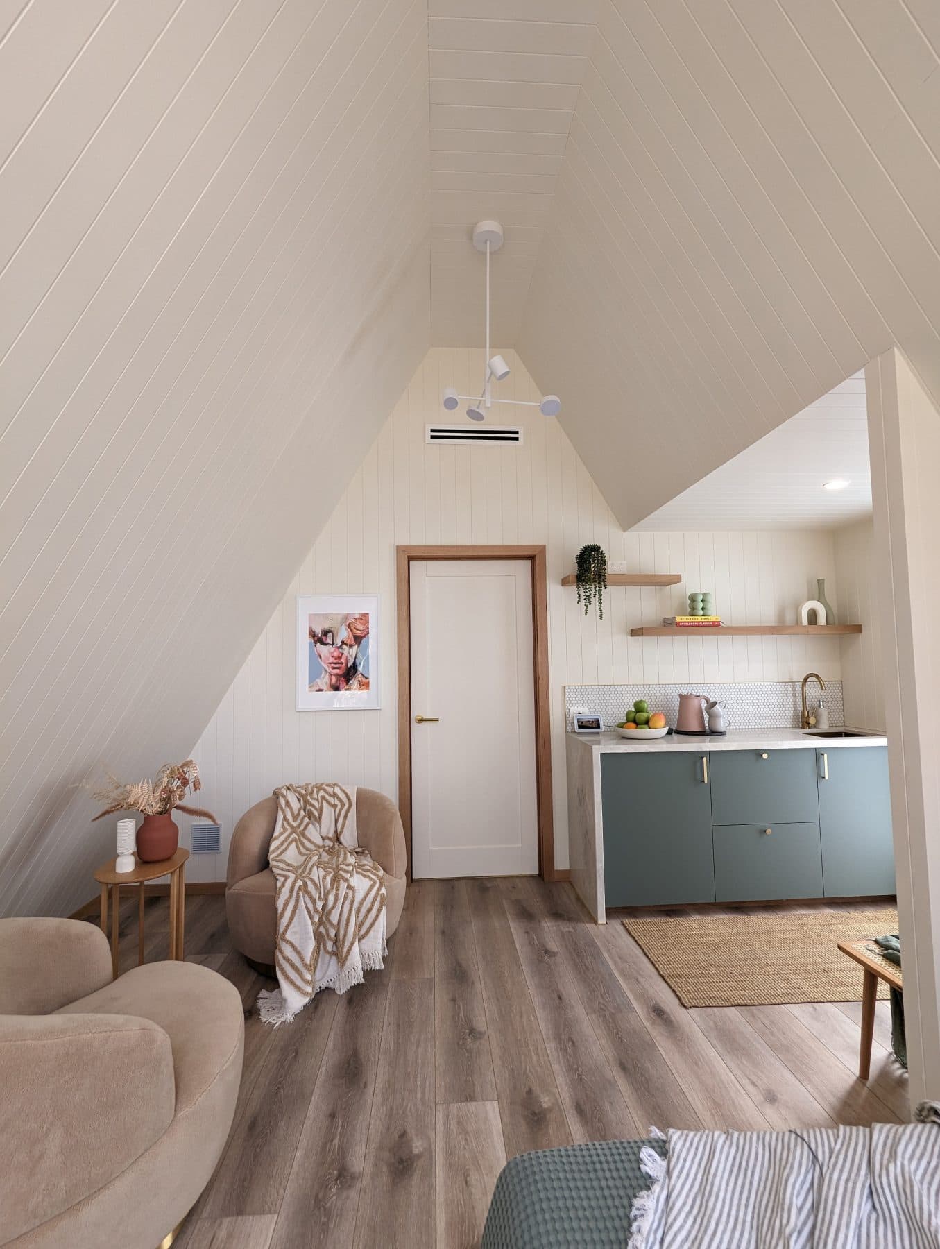 The cabin kitchenette, with the mini fridge under the bench