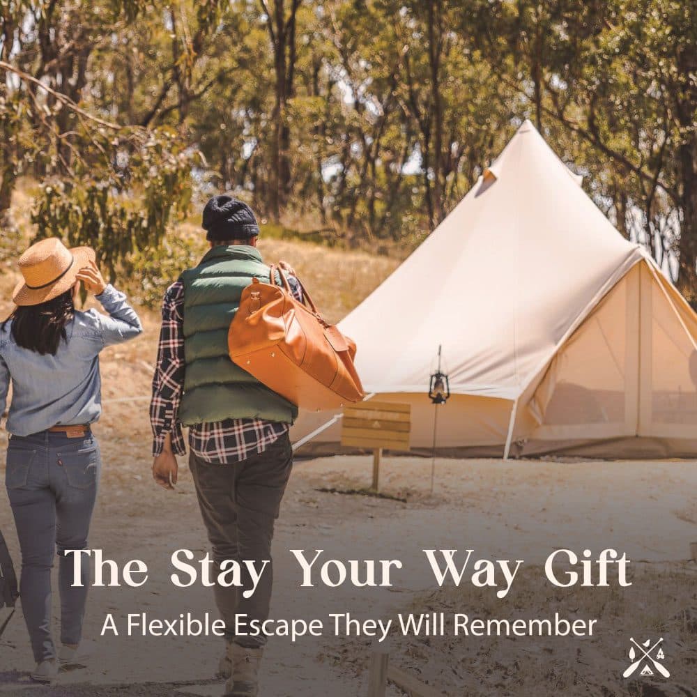The Stay Your Way Gift — two guests walking to a bell tent with an overnight bag